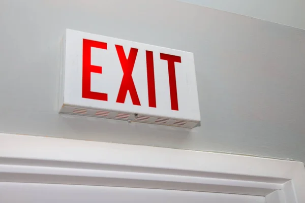 Exit Sign Above an Office Door