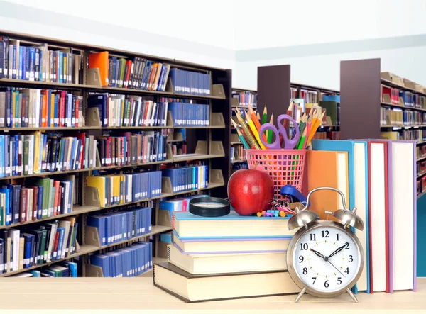 Stack of books in library — Stock Photo, Image