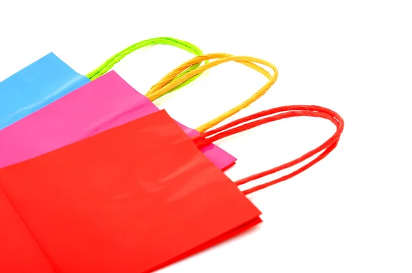 Tres bolsas de regalo de papel colorido —  Fotos de Stock