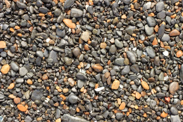 Wet Multi Colored Sea Pebbles Shore Surf — ストック写真