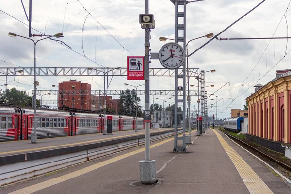 St.Petersburs, Russia - September, 05, 2020: Clocks and posters about safety rules at the Baltic railway station in St. Petersburg.