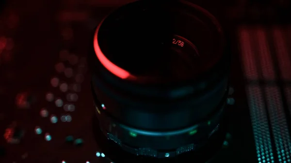 Awesome camera lens in red and cyan lights, Camera concept