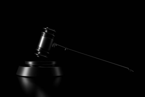 Light and shadow of gavel in the darkness. 3D rendering.