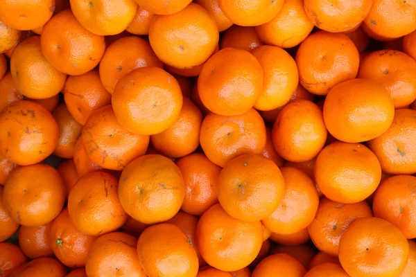 Πορτοκαλί φόντο φρούτων. Φρέσκα υγιεινά πορτοκάλια — Φωτογραφία Αρχείου