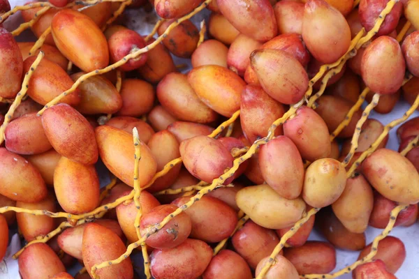 Pile of dates fruits in a shop. Dates fruits backgrounds