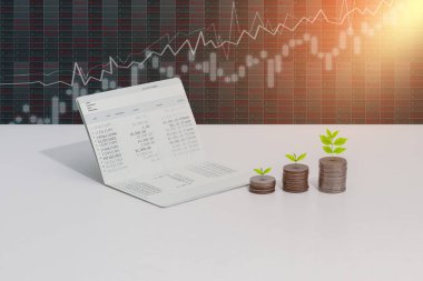 paralar, küçük ağaç ve hesap kitap banka düzenekte, bankacılık ve finans kavramı masanın üzerine yığını