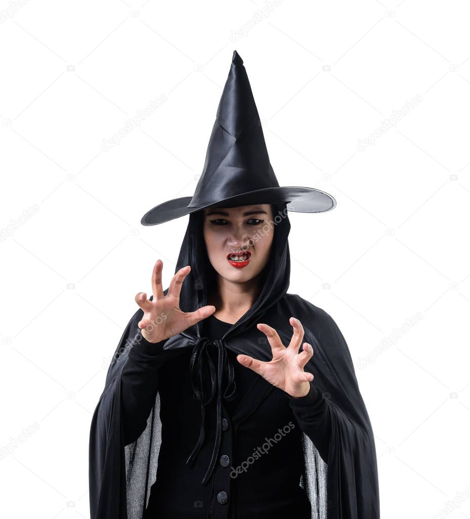 Portrait of woman in black Scary witch halloween costume standing with hat and mutter incantations  isolated on white background with clipping path