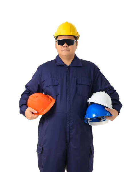 Retrato Trabalhador Macacão Mecânico Segurando Capacete Multicolor Com Óculos Segurança — Fotografia de Stock