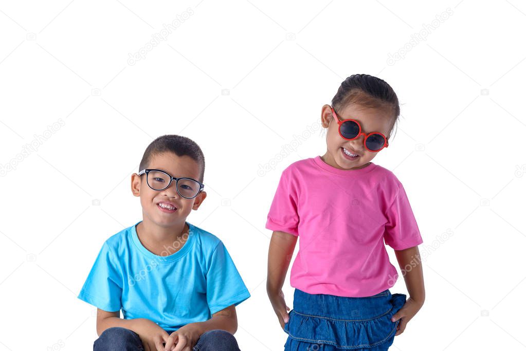 portrait of little boy and girl is colorful T-shirt with glasses isolated on white background with clipping path