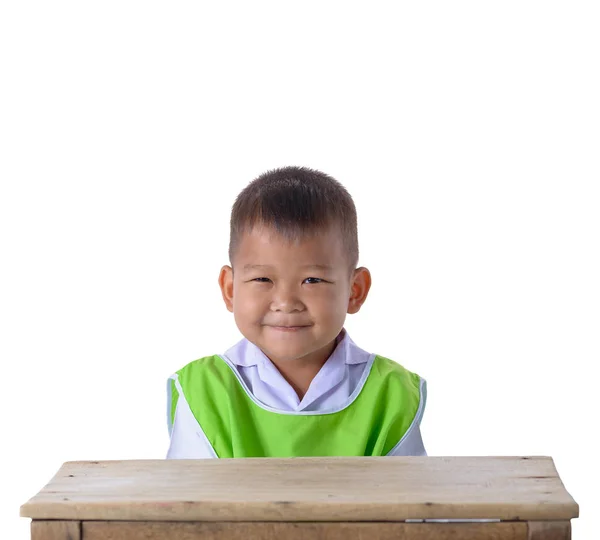 Ritratto Ragazzo Asiatico Uniforme Scolastica Sorridente Con Tavolo Legno Isolato — Foto Stock