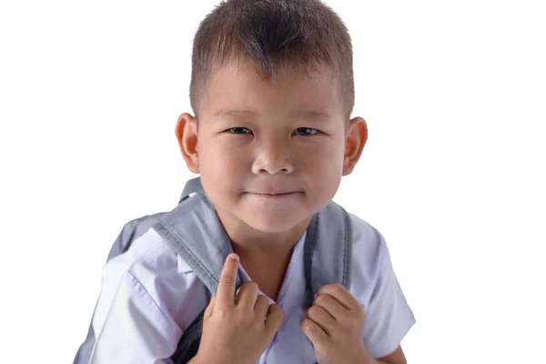 亚洲乡村男孩在校服的特写镜头与背包隔离在白色背景与剪裁路径 — 图库照片
