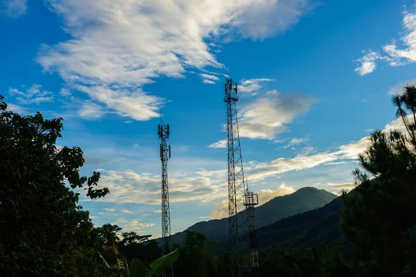 Telecommunication Tower. 3G, 4G and 5G Cell site, Cell Phone Signal Tower on blue sky background