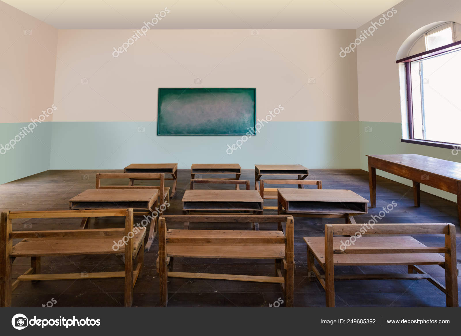 Antique Classroom In School With Rows Of Empty Wooden Desks