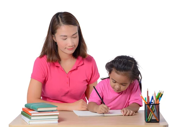 Joven maestro ayudando a niño con lección de escritura aislado en whit —  Fotos de Stock