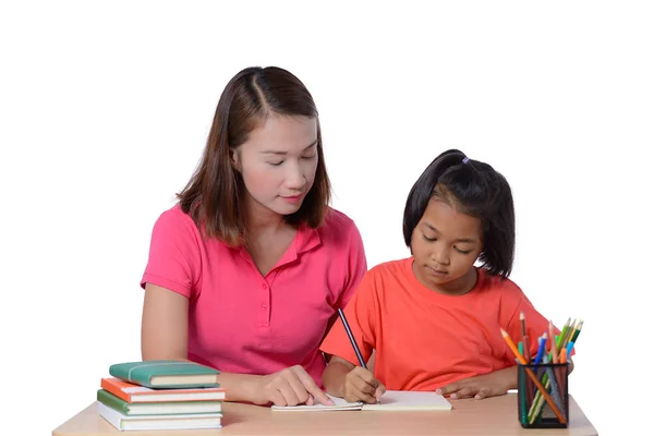 Joven maestro ayudando a niño con lección de escritura aislado en whit — Foto de Stock