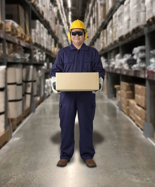 Worker in Mechanic Jumpsuit with holding parcel boxes — Stock Photo, Image