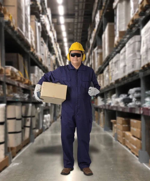 Worker in Mechanic Jumpsuit with holding parcel boxes — Stock Photo, Image