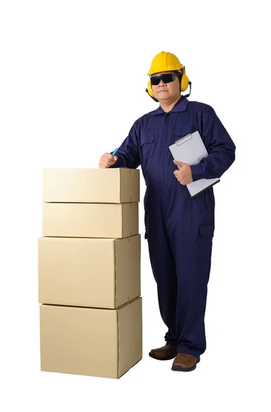 Worker in Mechanic Jumpsuit with stack of boxes and Checking Pro — Stock Photo, Image