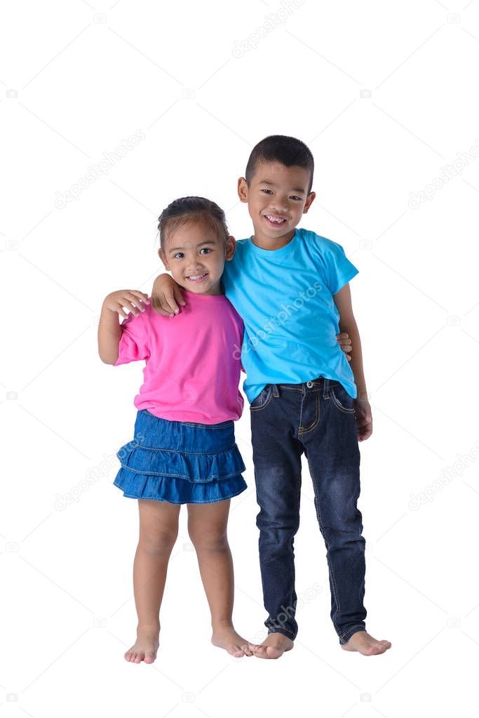 portrait of little boy and girl is colorful T-shirt with glasses