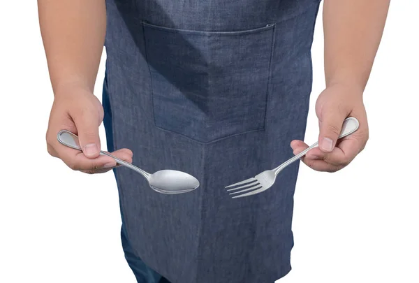 Asiatique serveur en chemise bleue avec tablier main tenant fourchette et spoo — Photo