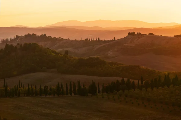 Toskánsko krajinní Panorama při západu slunce, Ital — Stock fotografie
