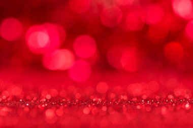 Bokeh etkisi ile parlak Festival kırmızı arka plan parlayan