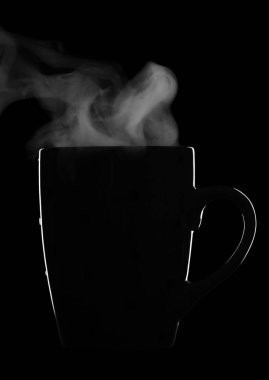 Siluet Kupası sıcak içecek ve üzerinde siyah bac izole Buhar ile