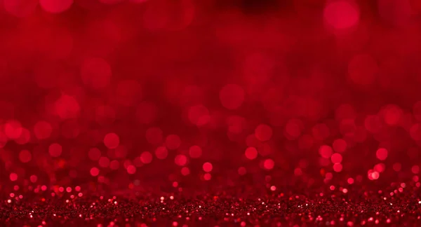 Brillante hermoso brillante fondo rojo con efecto bokeh —  Fotos de Stock