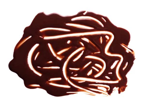 Chocolate drips. Melted chocolate on the surface, the patterns i — Stock Photo, Image