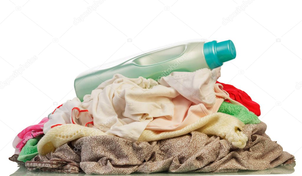 Mount the different colored dirty laundry isolated on white