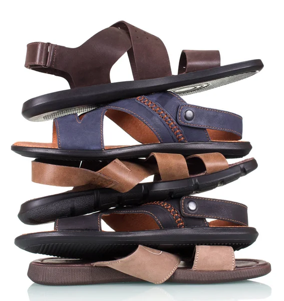 Stack of men's summer sandals isolated on white — Stock Photo, Image