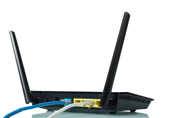 Router negro con cables azules y grises unidos aislados en blanco —  Fotos de Stock