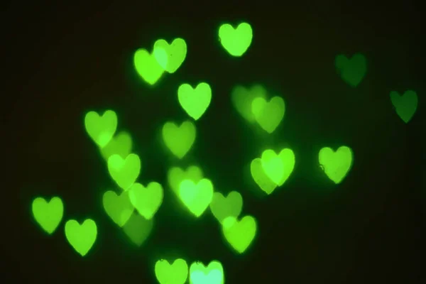 Verde fora de foco corações — Fotografia de Stock