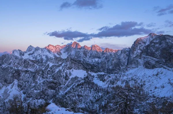 Beautiful rocky mountains covered in snow