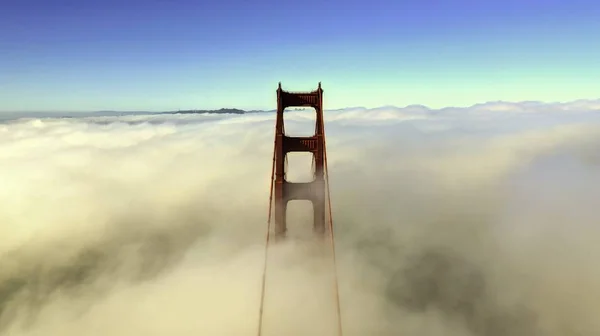 Beautiful Aerial Shot Top Bridge Surrounded Clouds Blue Sky Background — Stock Photo, Image