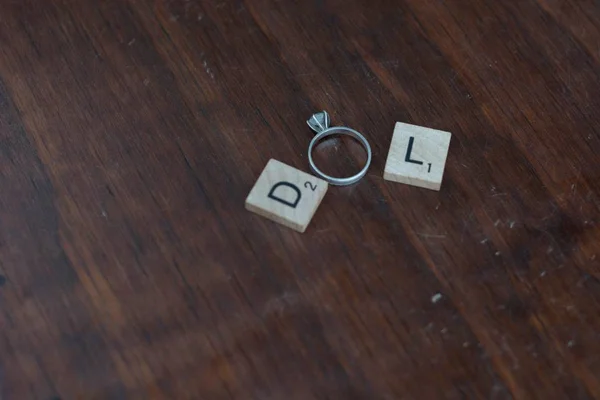 View of two letters accompanying an engagement ring — Stock Photo, Image