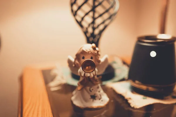 Closeup shot of small angel clay figurine — Stock Photo, Image