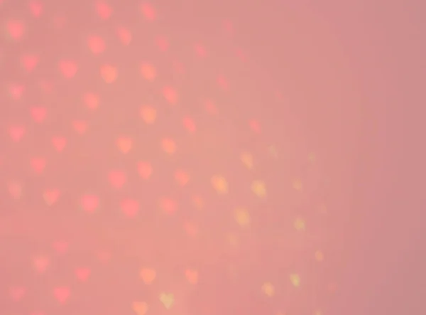 Hermoso fondo rosa con corazones desenfocados — Foto de Stock