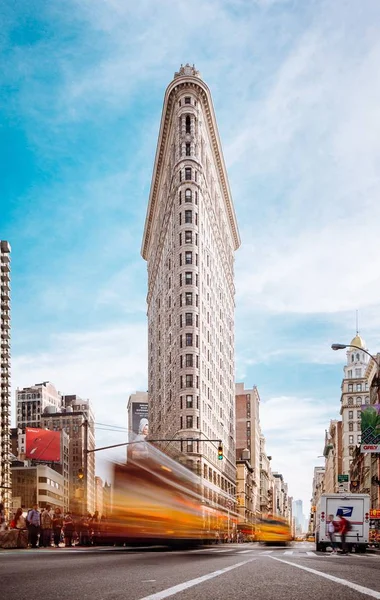 The Flatiron building with moving traffic