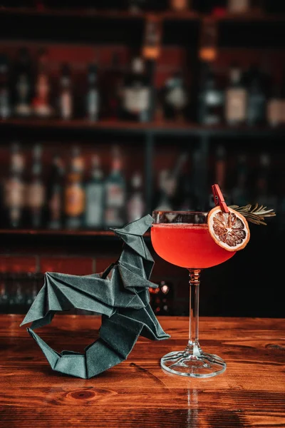 Exotic cocktail with origami — Stock Photo, Image