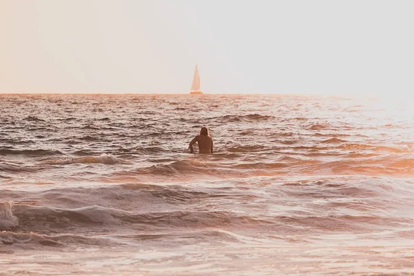 A person swimming in the sea — Stock Photo, Image