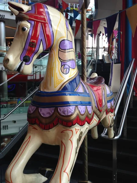 Vertical closeup shot of colorful carousel horse — Stock Photo, Image