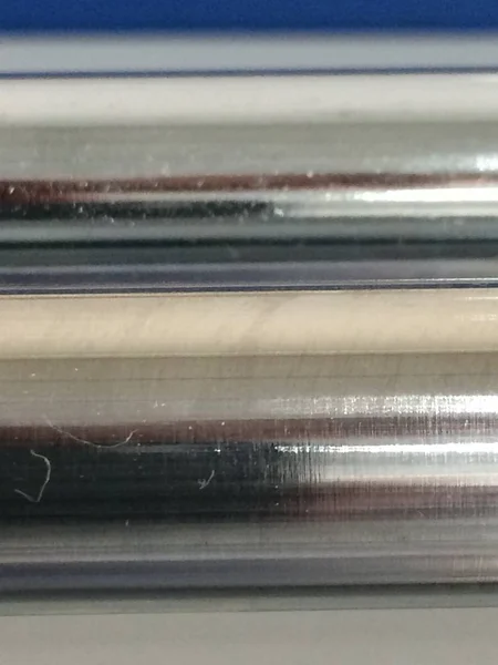 Vertical closeup shot of a two metal bars — Stock Photo, Image