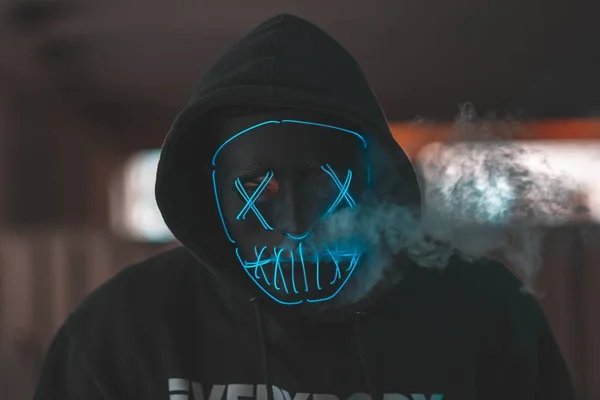 Person Wearing Black Blue Decorative Mask Hoodie Jacket — Stock Photo, Image