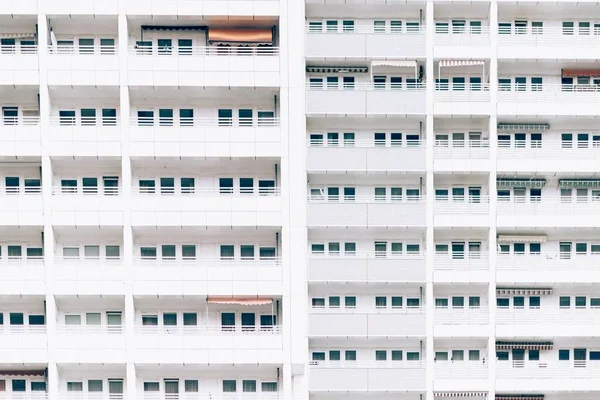 Beautiful shot of white apartments with balconies