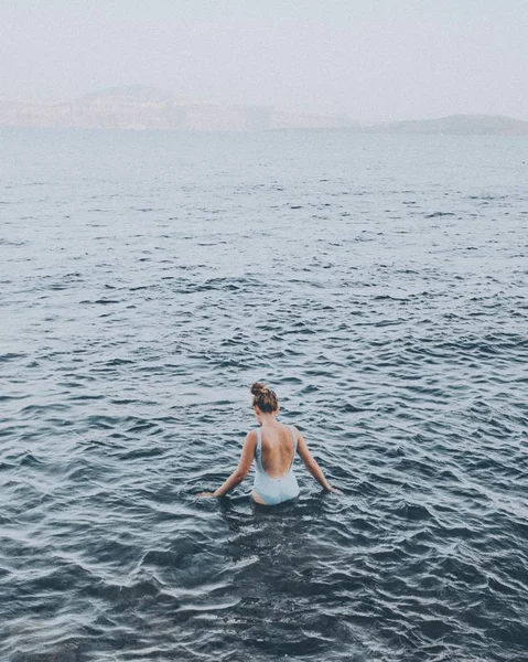 Female Walking Water Foggy Background Shot Stock Picture