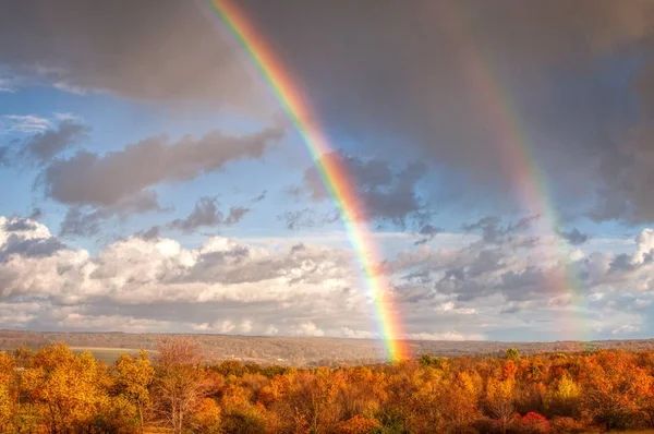 Beautiful double rainbow over the countryside field during sunset in Northwest Pennsylvania — Stock Photo, Image