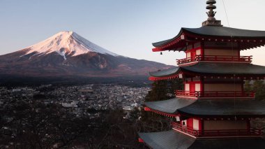 Horizontal shot of the red Chureito Pagoda in Japan, with Fujiyama (Mount Fuji) in the background clipart