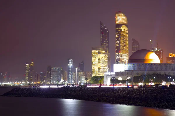 stock image City of Dubai at night and a lake with its beautiful skyscrapers in the background