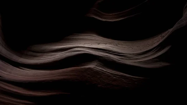 Dech beroucí scenérie krásných pískových textur ve tmě v Antelope Canyon, USA — Stock fotografie